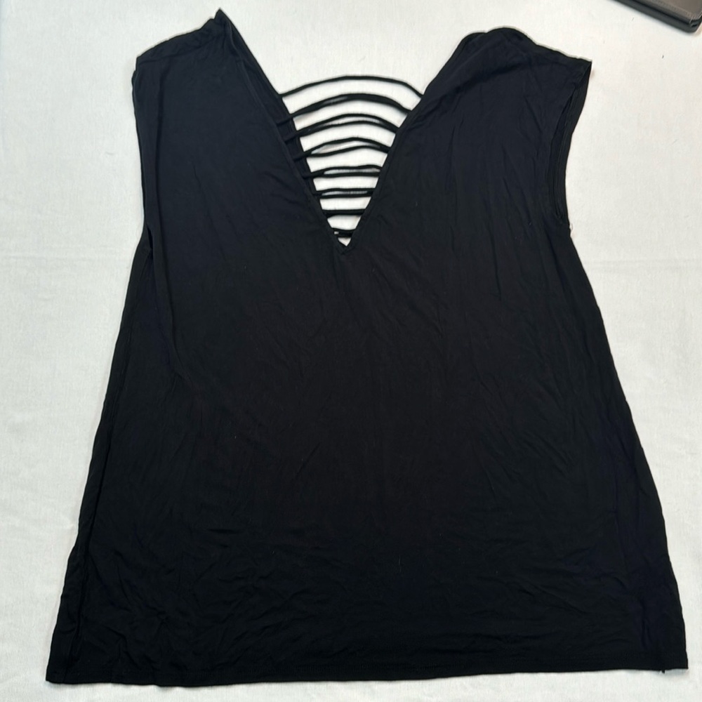Size Medium black sexy t shirt , so soft!